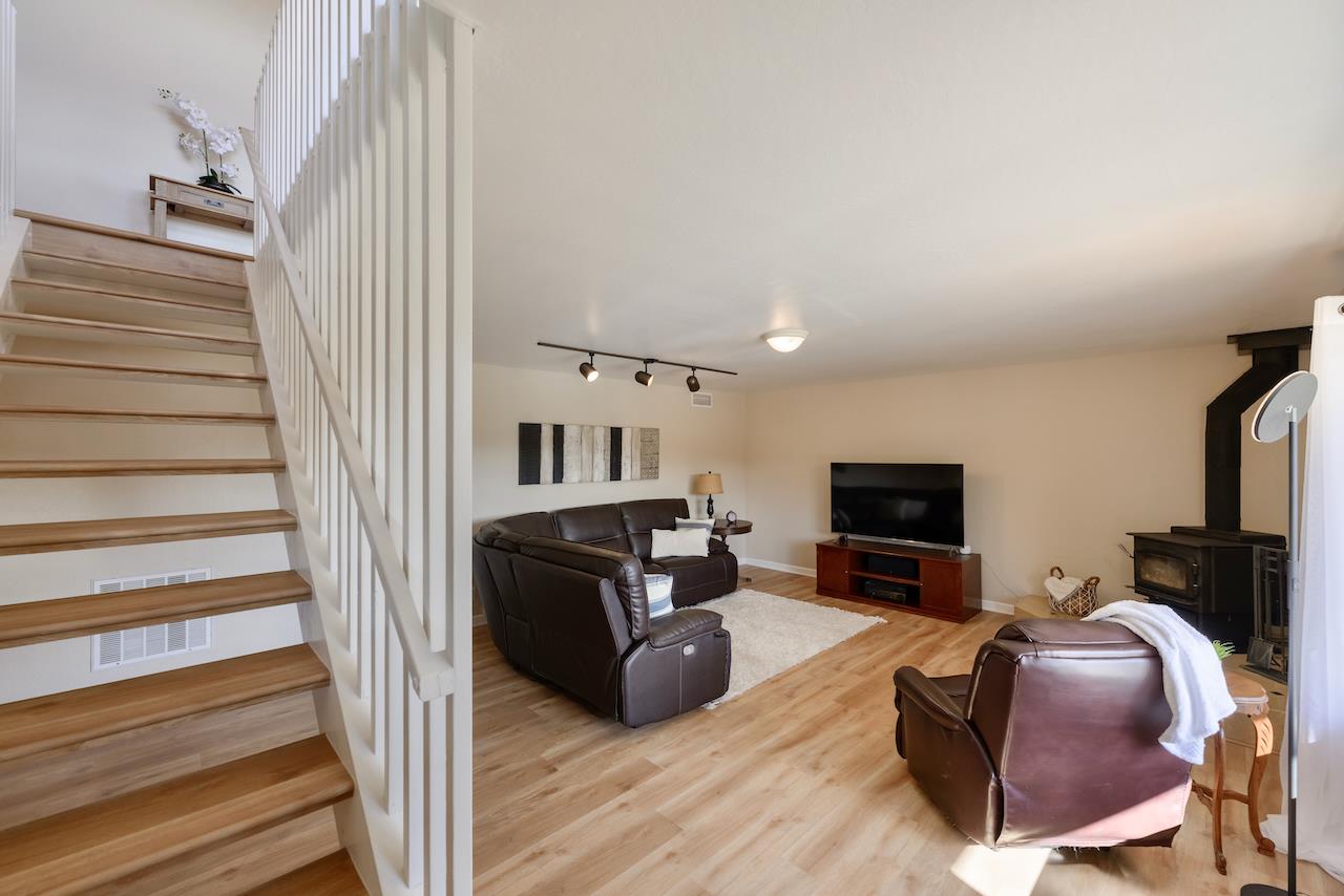 155 Rabbits Run Road Santa Cruz, CA 95060 - Photo 69 of 113 a living room with furniture and a flat screen tv