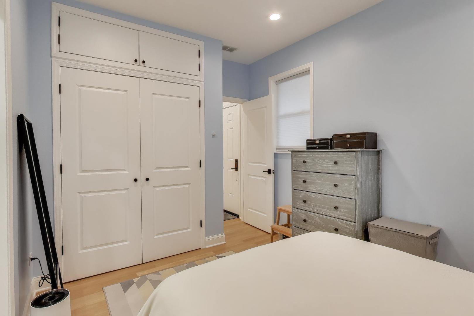 1811 South Laflin Street, Unit 2 Chicago, IL 60608 - Photo 11 of 20 a bedroom with a bed and a closet