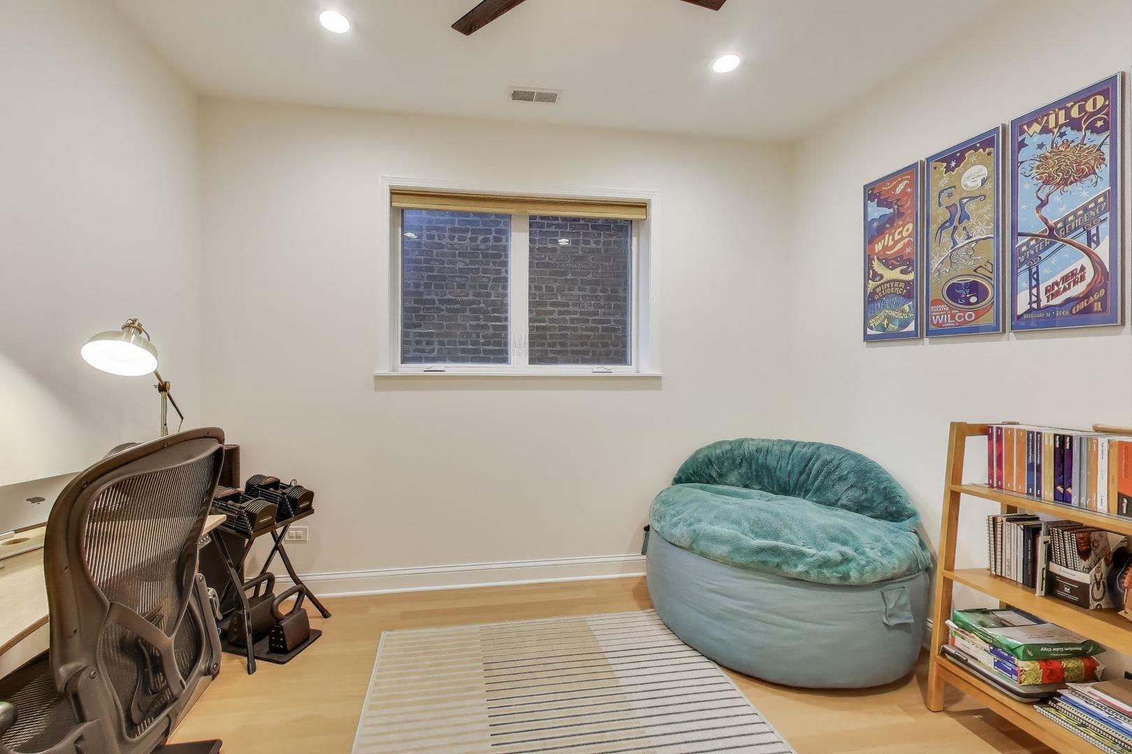 1811 South Laflin Street, Unit 2 Chicago, IL 60608 - Photo 13 of 20 a living room with furniture and a window