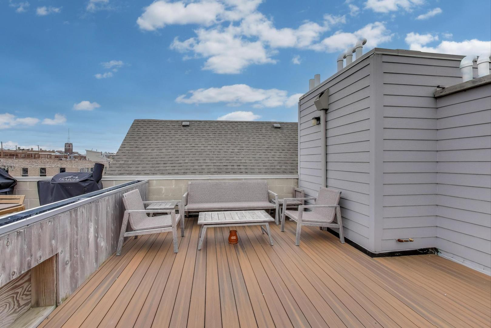 1811 South Laflin Street, Unit 2 Chicago, IL 60608 - Photo 18 of 20 a roof deck view with a seating space