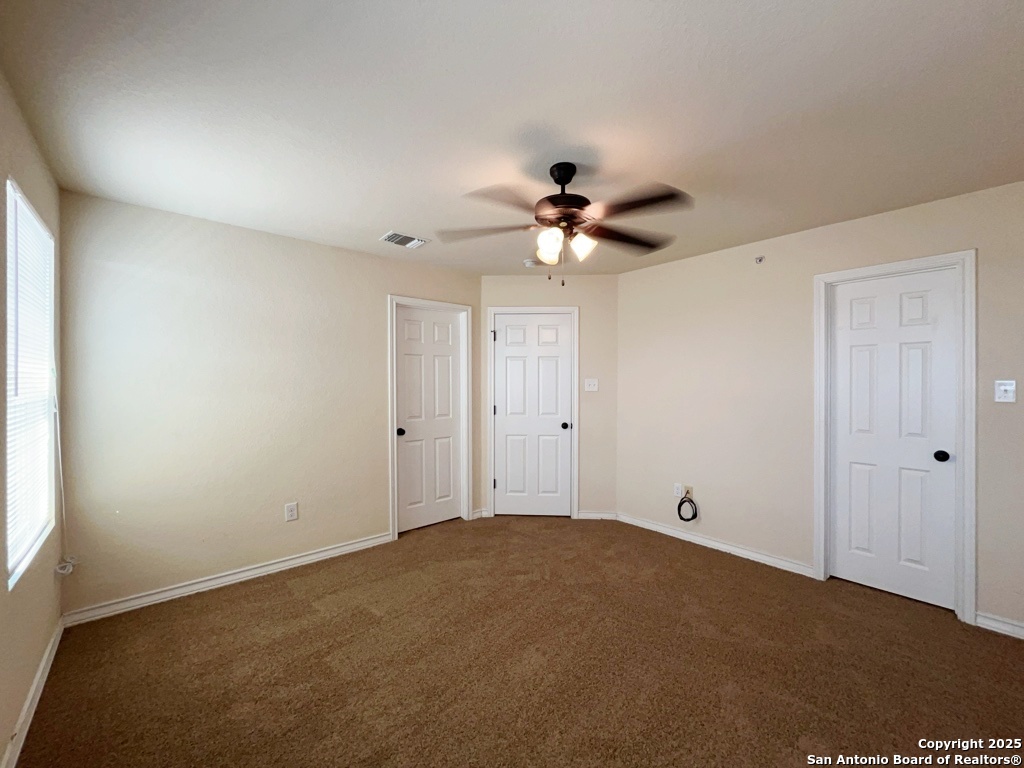 16821 Showdown Path, Unit 3 Selma, TX 78154 - Photo 19 of 37 a view of a big room with carpet