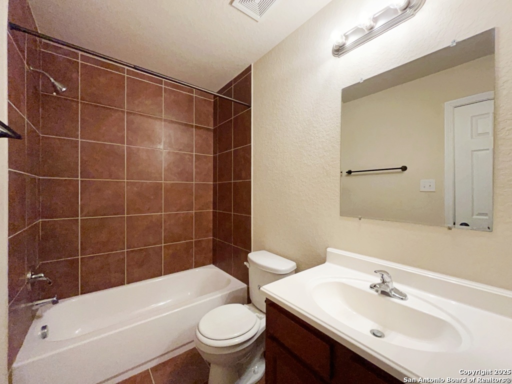 16821 Showdown Path, Unit 3 Selma, TX 78154 - Photo 21 of 37 a bathroom with a sink toilet and shower