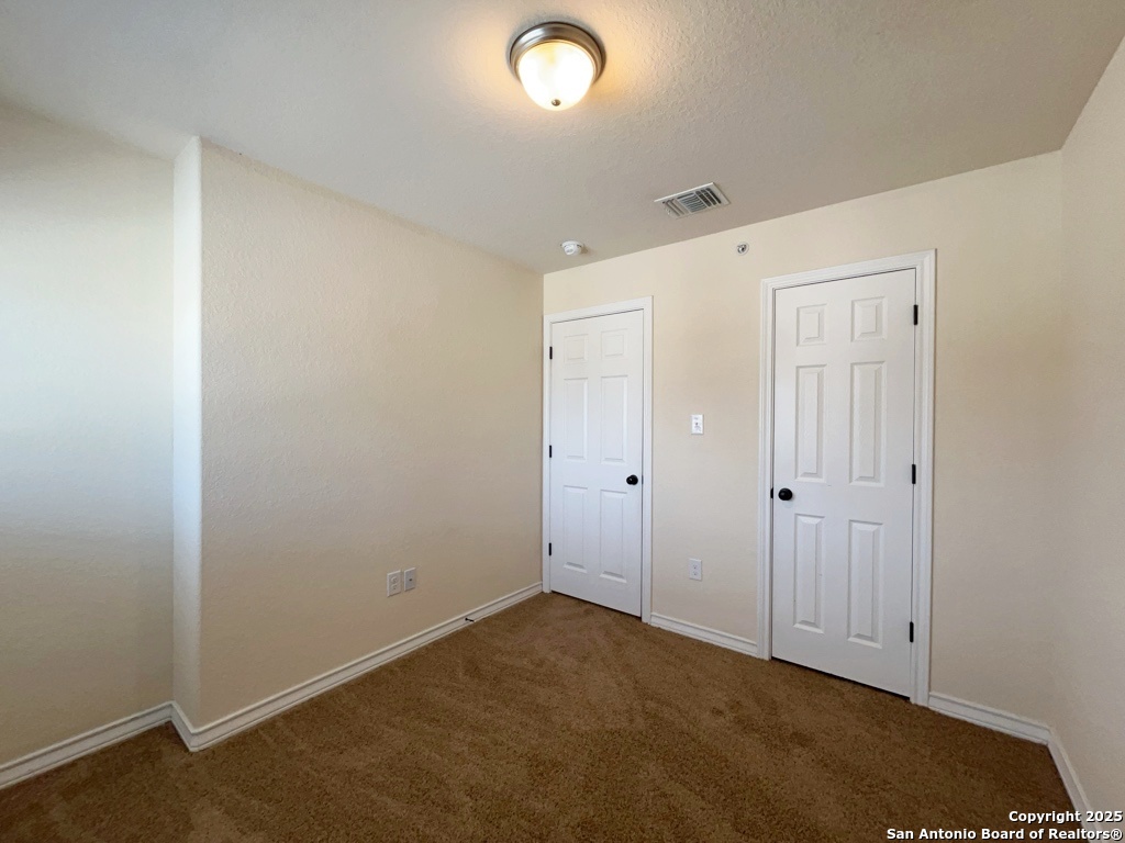 16821 Showdown Path, Unit 3 Selma, TX 78154 - Photo 25 of 37 a view of an empty room