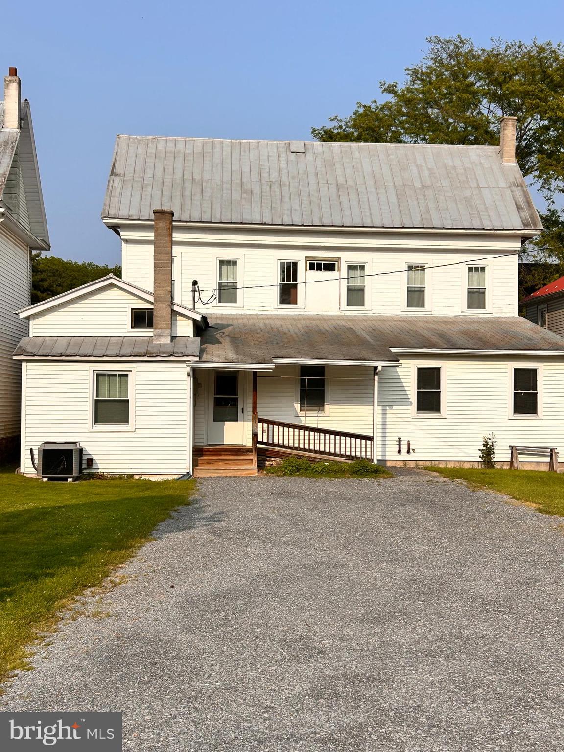 a front view of house with yard