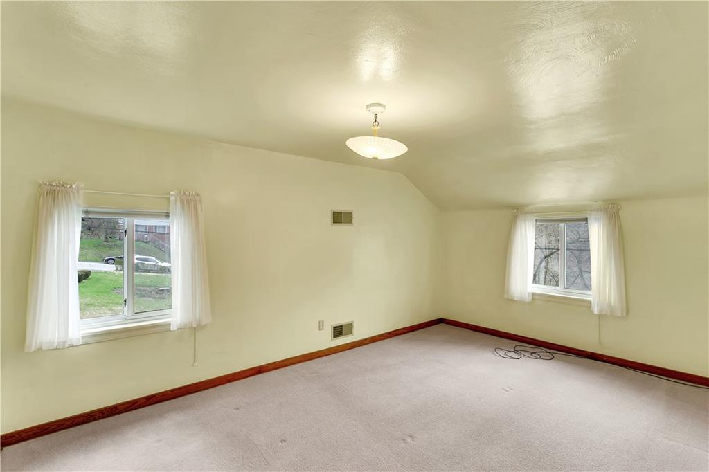 767 Beulah Road Pittsburgh, PA 15235 - Photo 22 of 25 an empty room with a window