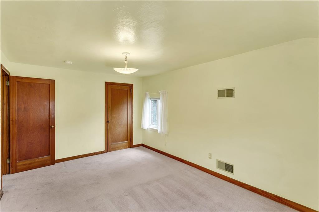 767 Beulah Road Pittsburgh, PA 15235 - Photo 23 of 25 a view of an empty room and a window