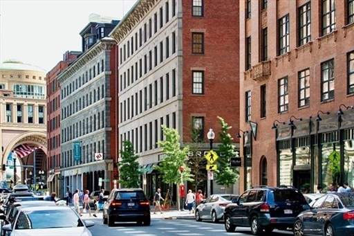 101 Broad Street, Unit 3B Boston, MA 02110 - Photo 17 of 19 a car parked in front of a building