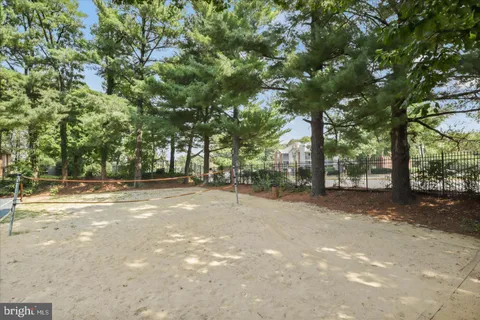 a view of a tree in front of a house