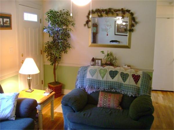 274 Wallace Hill Road Townsend, MA 01469 - Photo 15 of 27 a living room with furniture and a lamp
