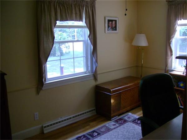 274 Wallace Hill Road Townsend, MA 01469 - Photo 17 of 27 a room with furniture and a window