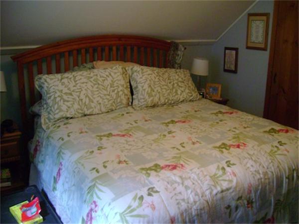 274 Wallace Hill Road Townsend, MA 01469 - Photo 23 of 27 a bedroom with a bed and dresser