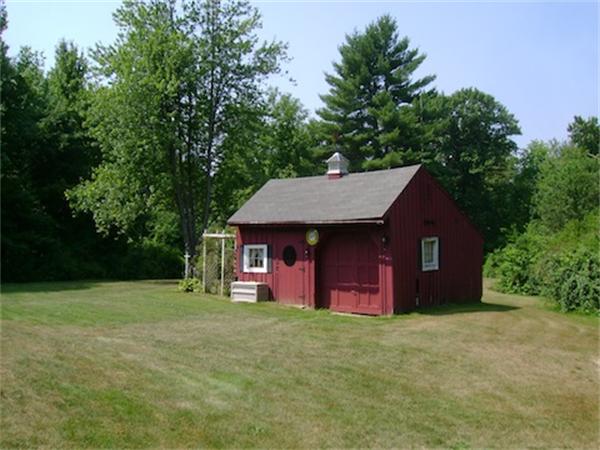 274 Wallace Hill Road Townsend, MA 01469 - Photo 8 of 27 a view of a house with a backyard