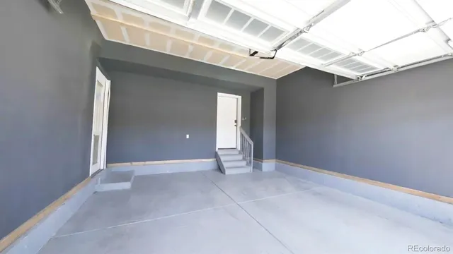 a view of a backyard with a garden and plants