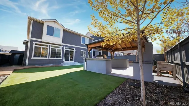 a view of swimming pool with seating space