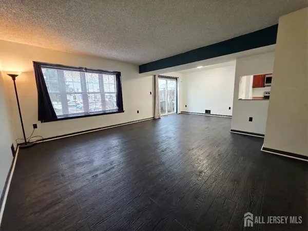 a picture of a wall with a white wall and a white refrigerator