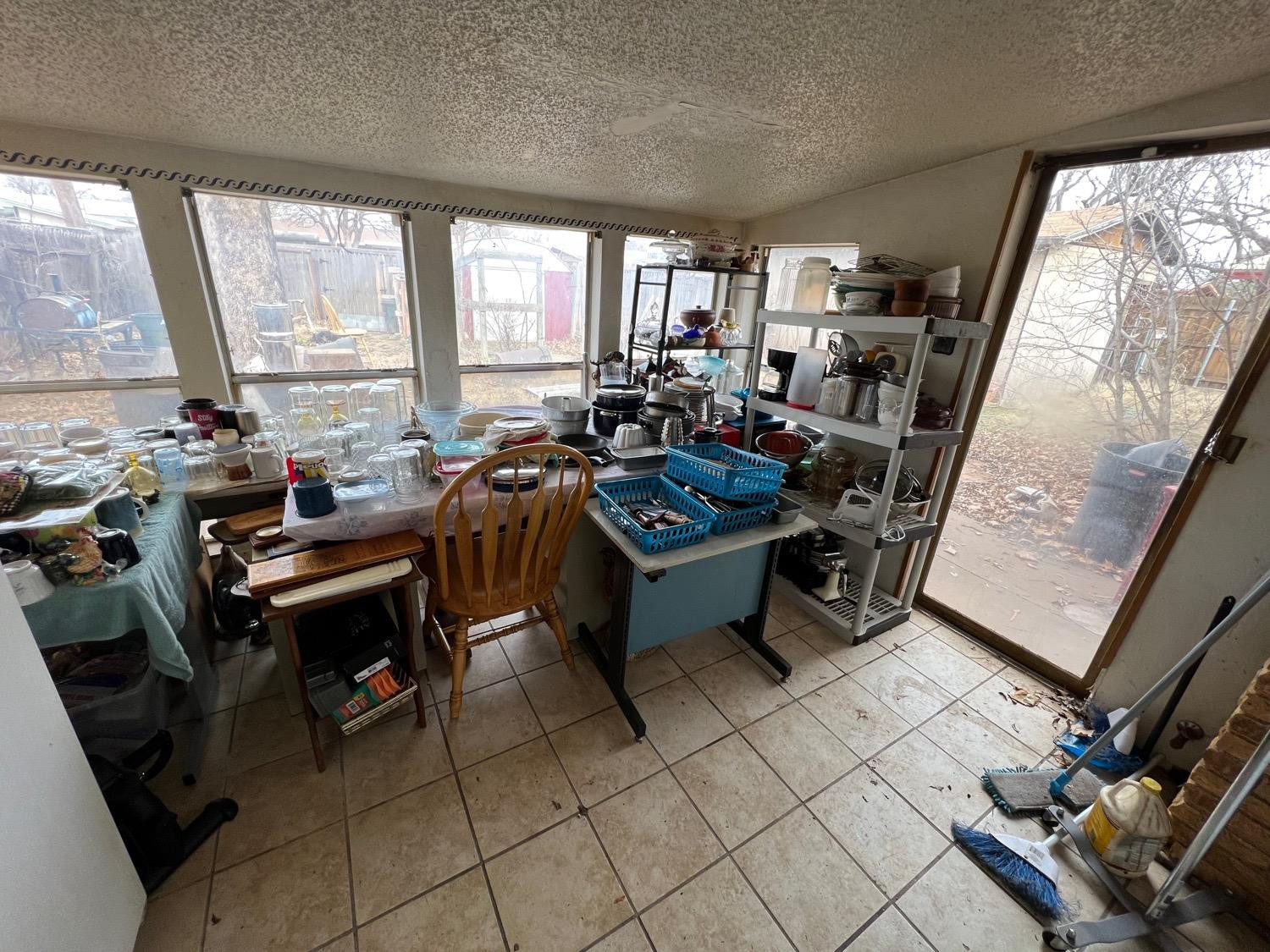 4812 46th Street Lubbock, TX 79414 - Photo 6 of 9 a room with lots of furniture and a large window