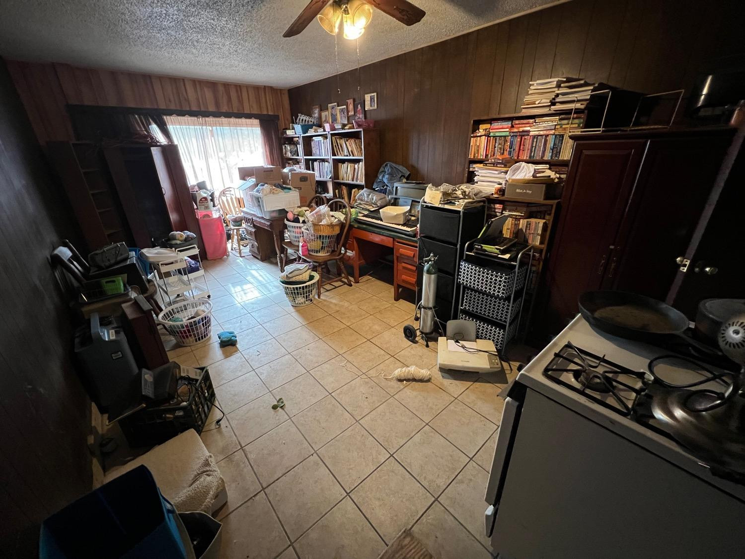 4812 46th Street Lubbock, TX 79414 - Photo 8 of 9 a room with furniture and a flat screen tv