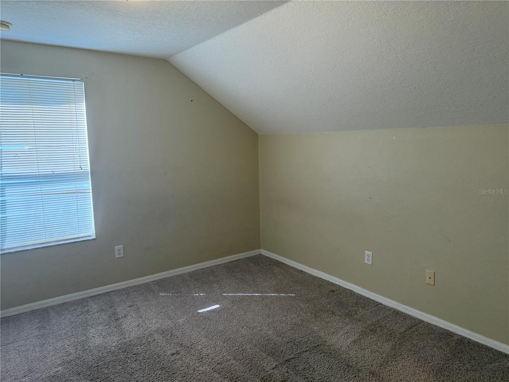 6509 Bridgecrest Drive Lithia, FL 33547 - Photo 12 of 15 an empty room with a window