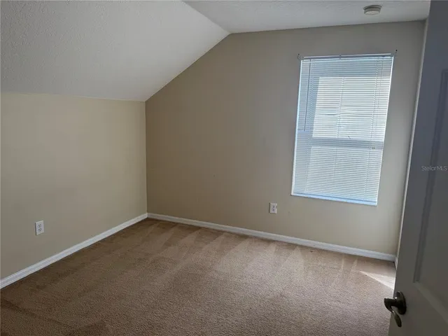 a bathroom with a sink a toilet and a tub