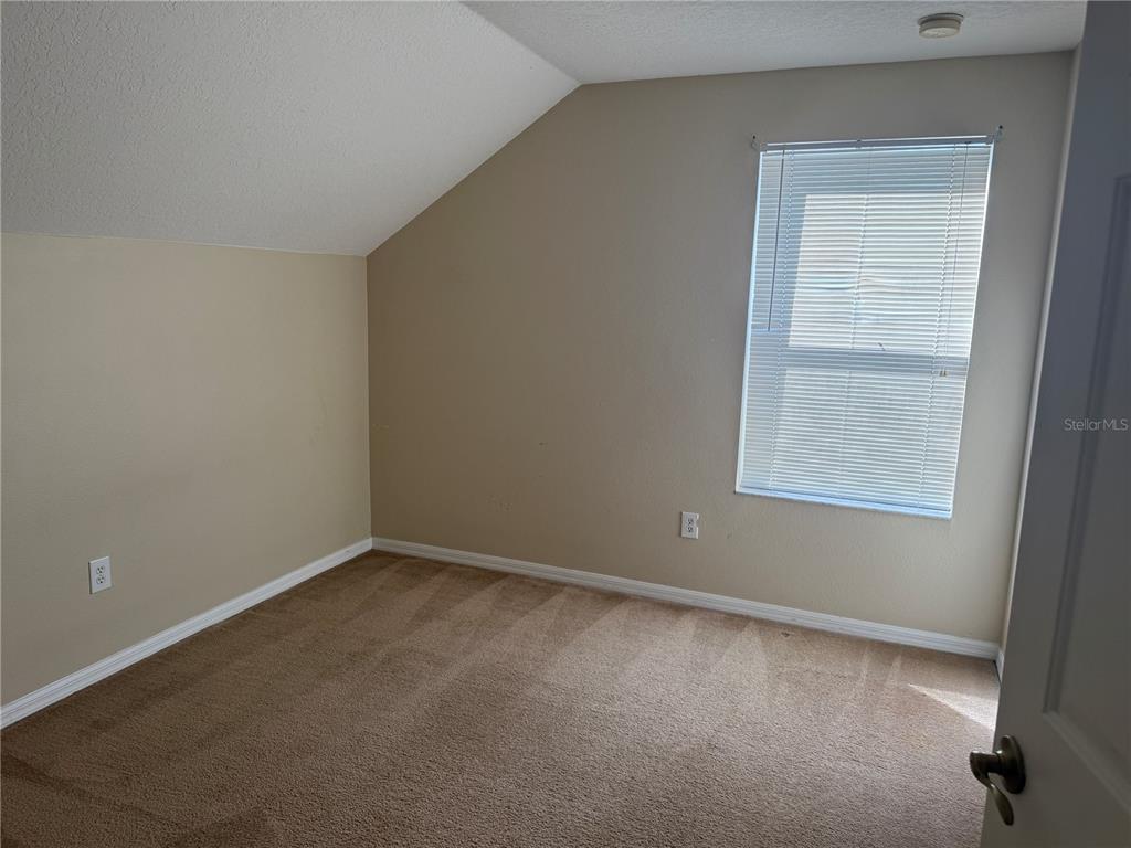 6509 Bridgecrest Drive Lithia, FL 33547 - Photo 13 of 15 an empty room with a window