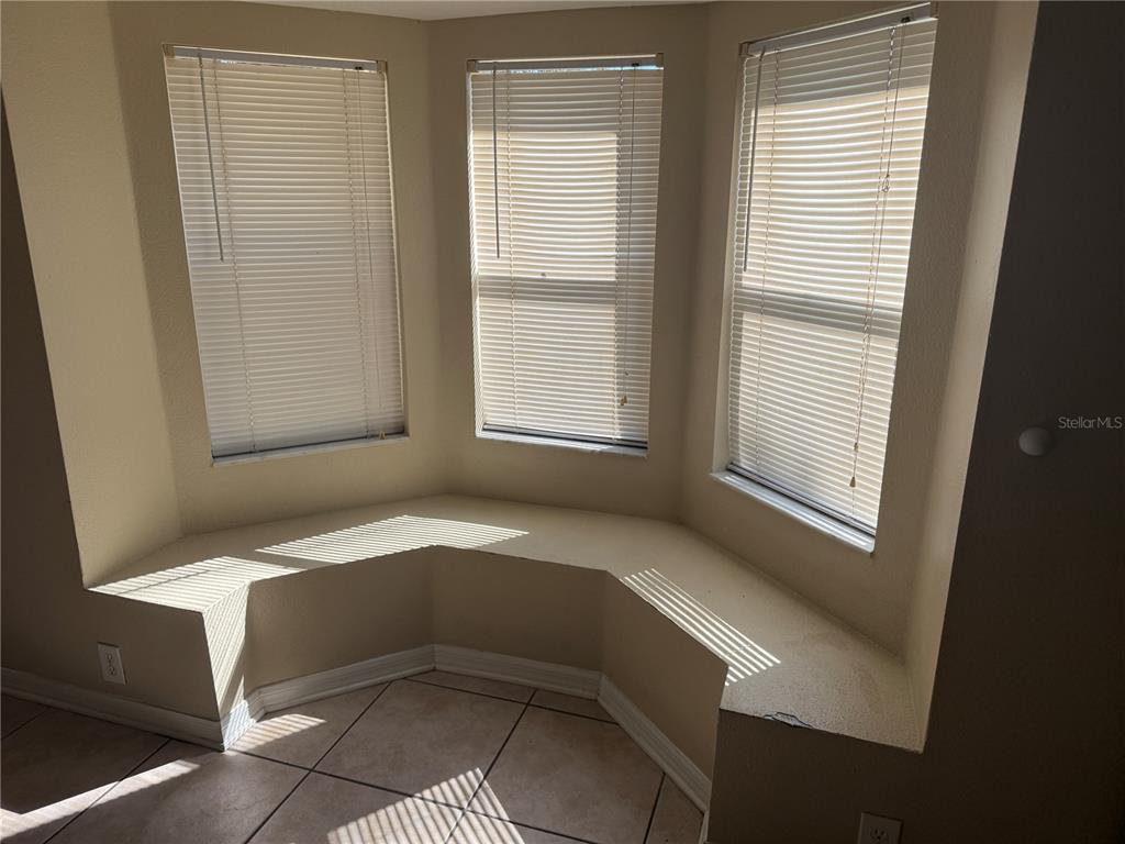6509 Bridgecrest Drive Lithia, FL 33547 - Photo 5 of 15 a bedroom with a bed and a window