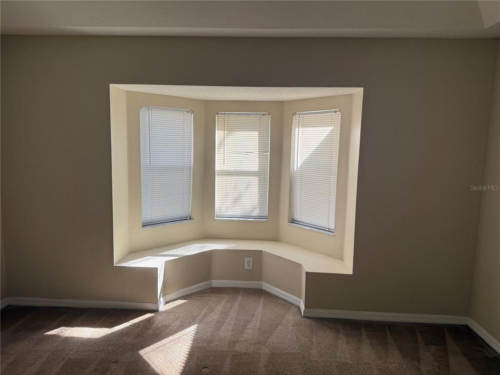 6509 Bridgecrest Drive Lithia, FL 33547 - Photo 9 of 15 a view of an empty room with a window