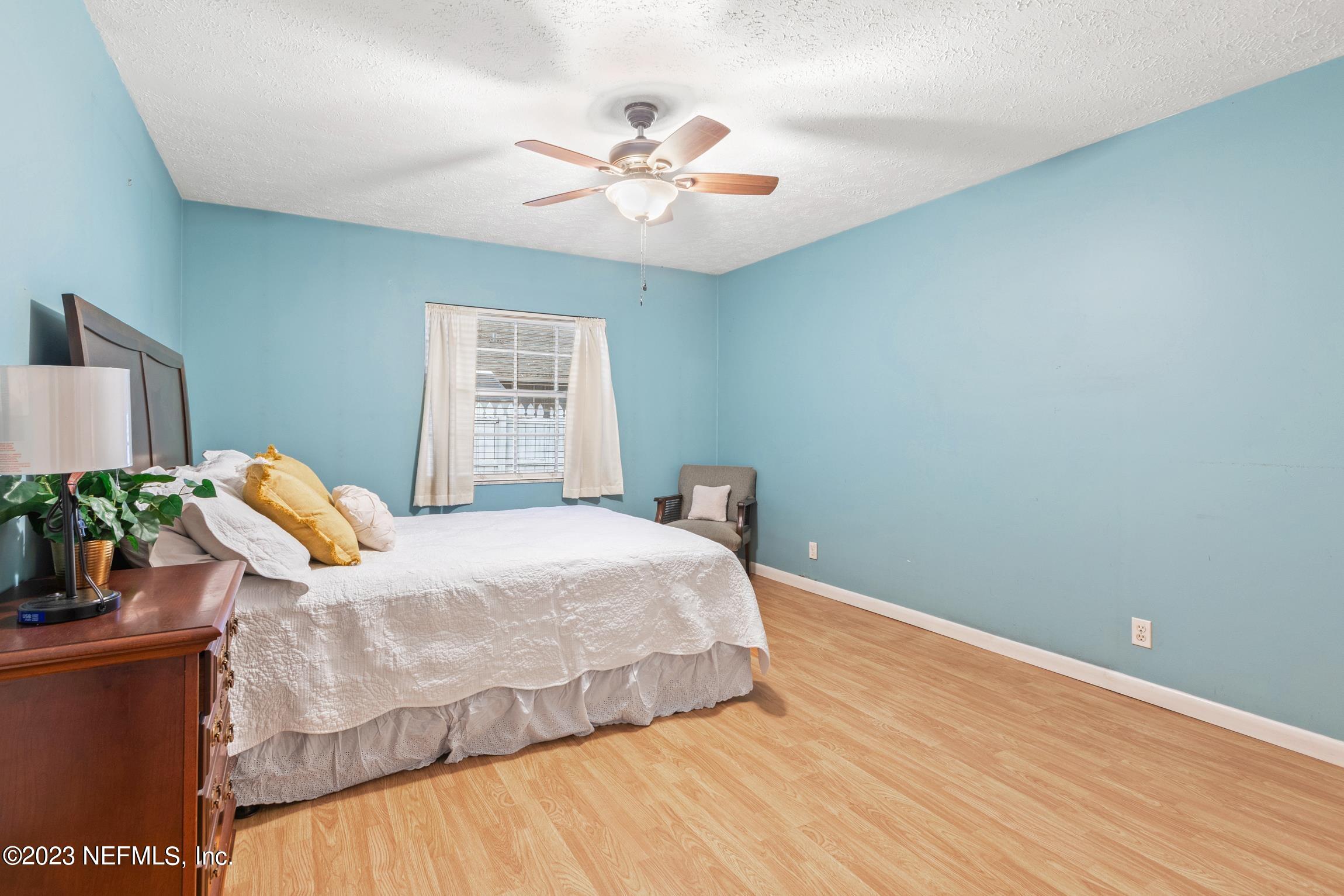 1131 Prince Road St. Augustine, FL 32086 - Photo 22 of 29 a bedroom with a bed and ceiling fan