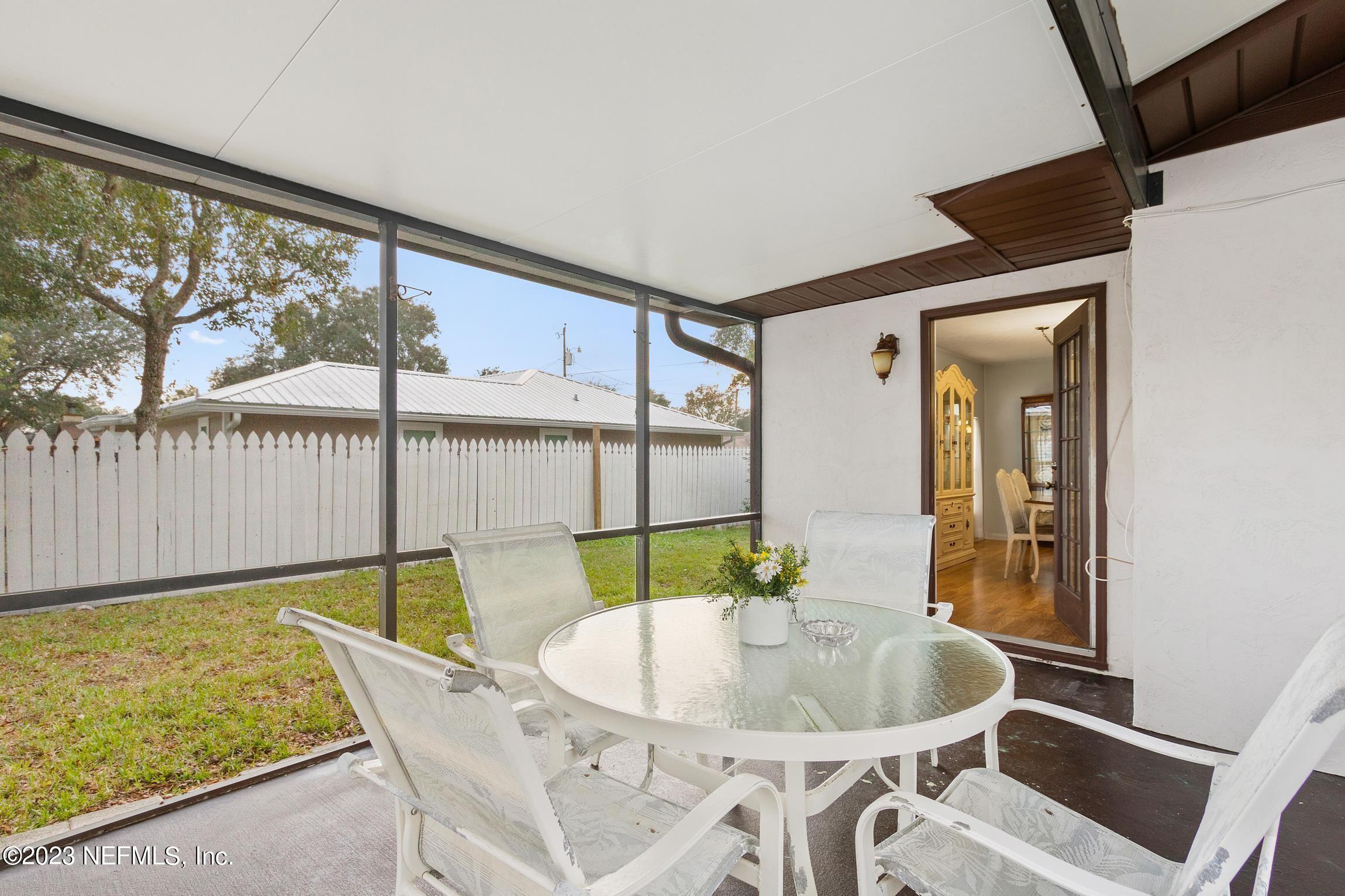 1131 Prince Road St. Augustine, FL 32086 - Photo 23 of 29 a balcony with table and chairs