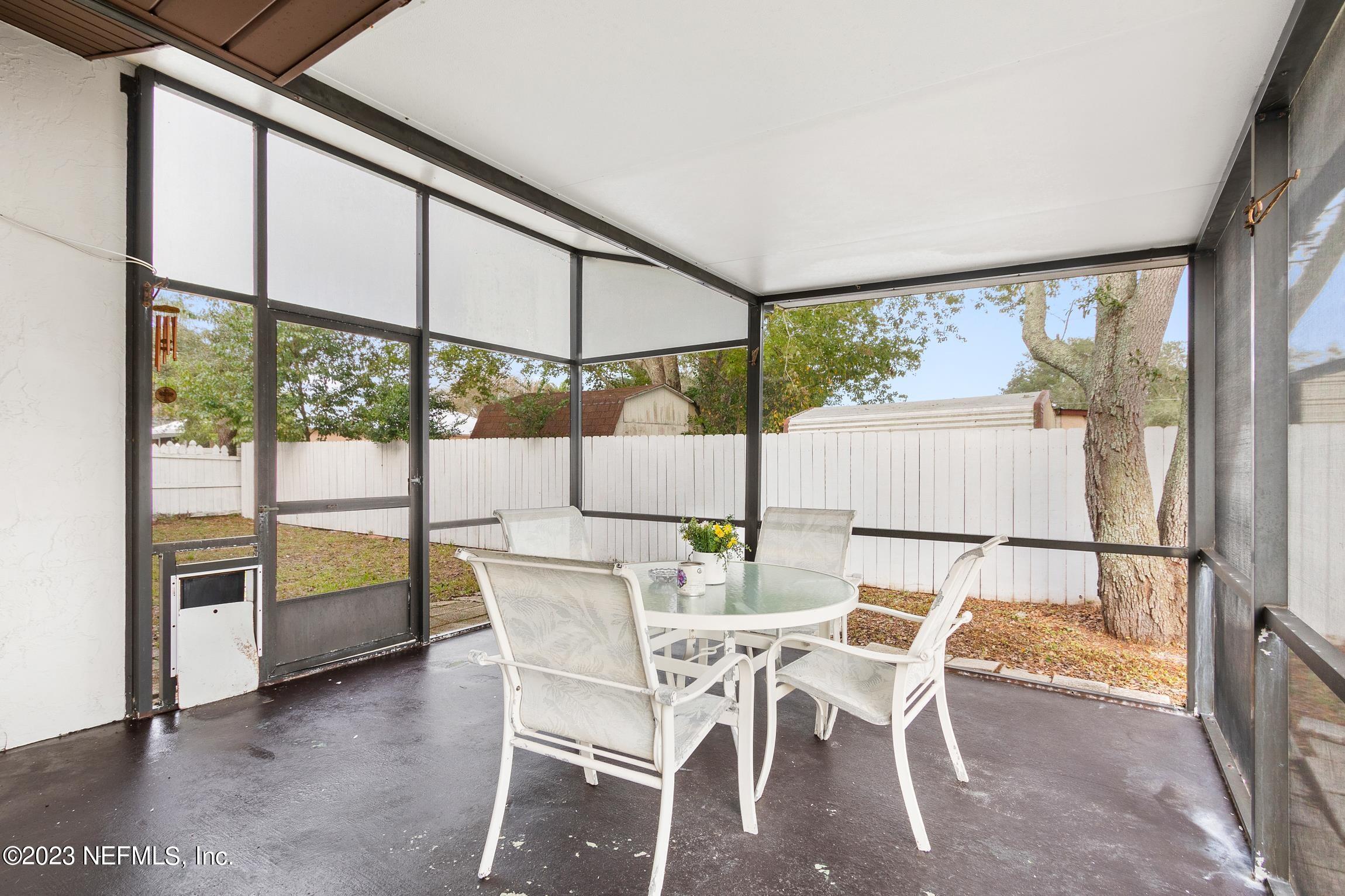 1131 Prince Road St. Augustine, FL 32086 - Photo 24 of 29 a dining room with furniture and a window