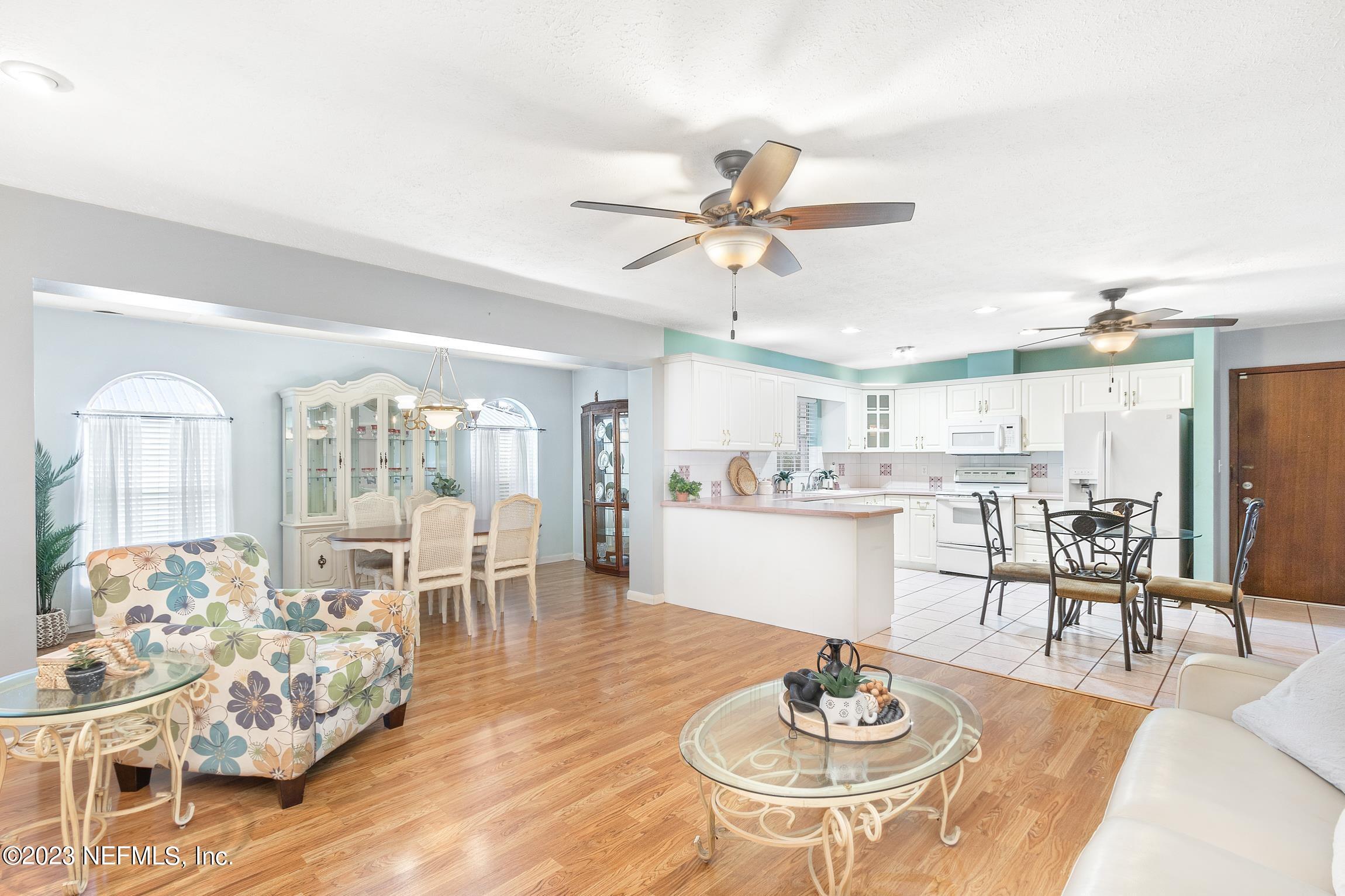 1131 Prince Road St. Augustine, FL 32086 - Photo 8 of 29 a living room with furniture and a table