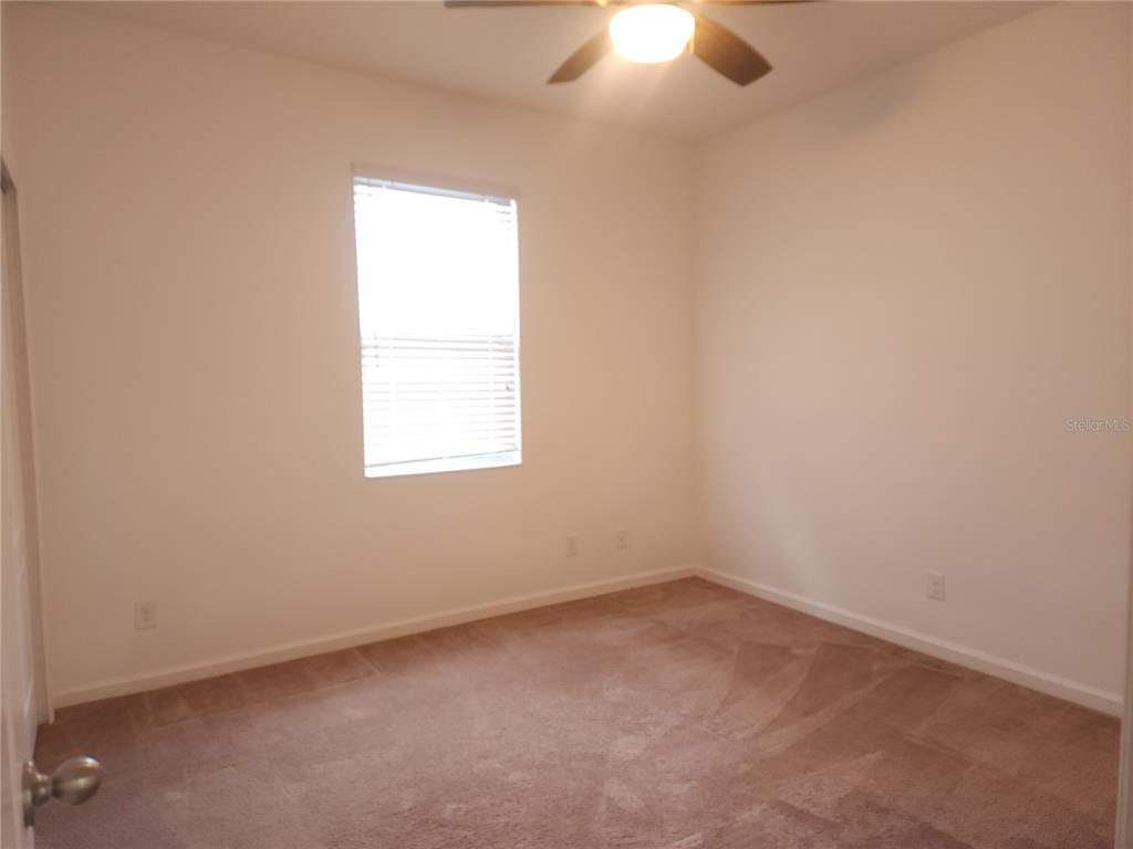 3230 Stratton Circle Kissimmee, FL 34744 - Photo 18 of 28 an empty room with a window