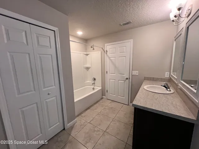 a bathroom with a toilet and sink