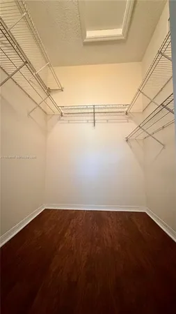 a view of a room with racks on the wall