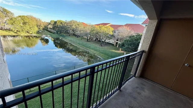 a view of a lake from a balcony