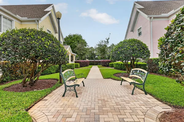 a view of backyard with outdoor seating