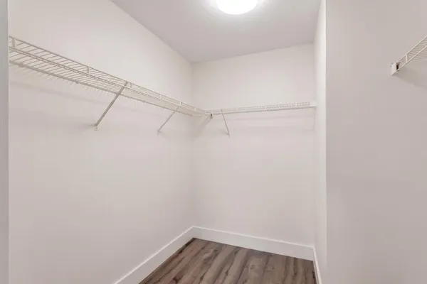 a view of an empty walk in closet