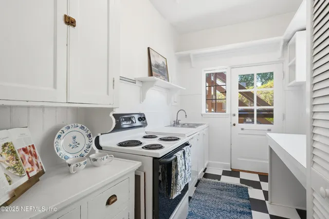 a view of a glass door with a balcony