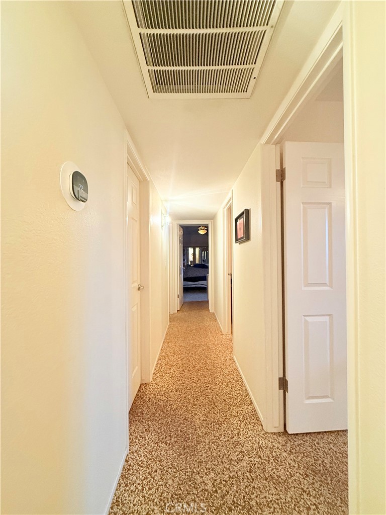 6380 North 5th Street Fresno, CA 93710 - Photo 13 of 31 a view of hallway with wooden floor