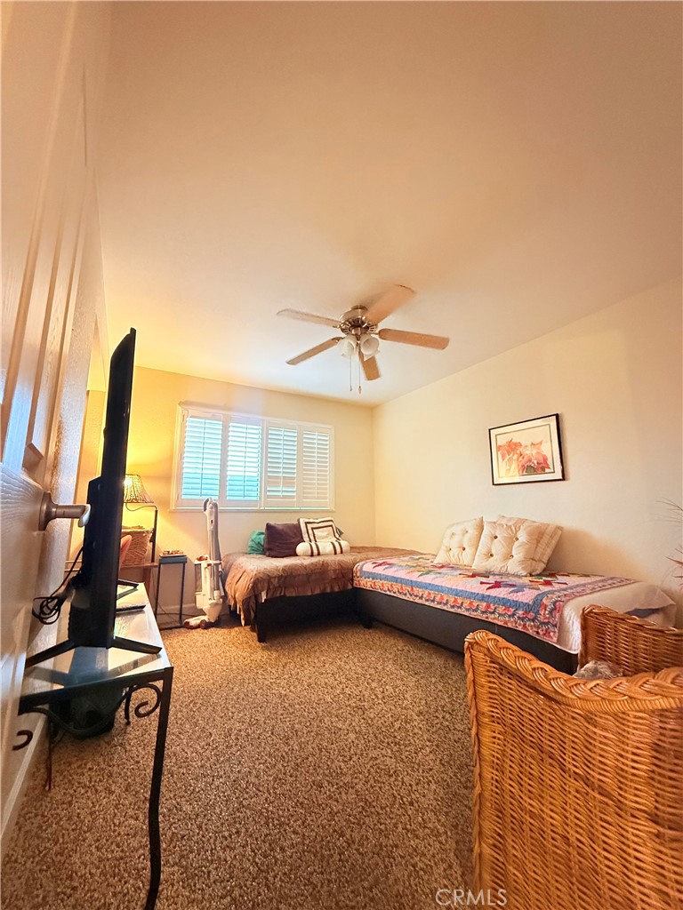 6380 North 5th Street Fresno, CA 93710 - Photo 14 of 31 a living room with furniture and a flat screen tv