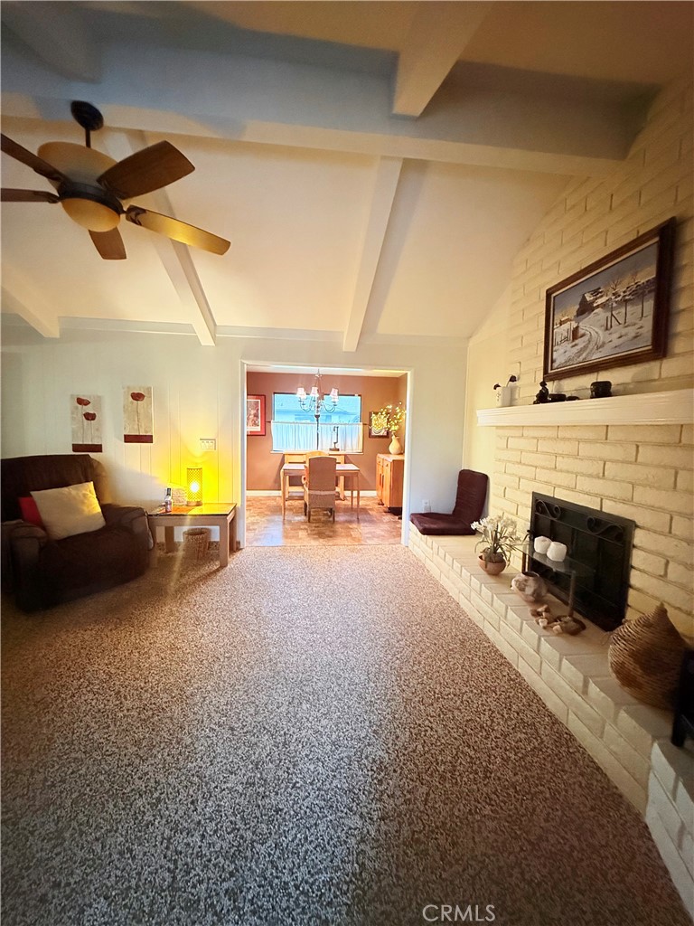 6380 North 5th Street Fresno, CA 93710 - Photo 16 of 31 a view of a livingroom with furniture and a fireplace