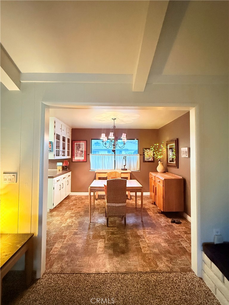6380 North 5th Street Fresno, CA 93710 - Photo 22 of 31 a living room with furniture and a large window