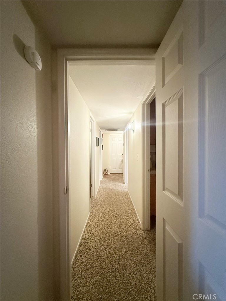 6380 North 5th Street Fresno, CA 93710 - Photo 7 of 31 a view of hallway with wooden floor