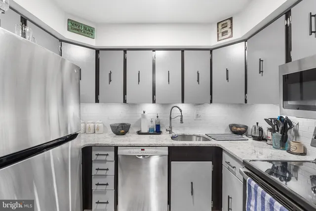 a bathroom with a sink double vanity and a mirror