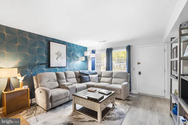 a living room with furniture and a couch