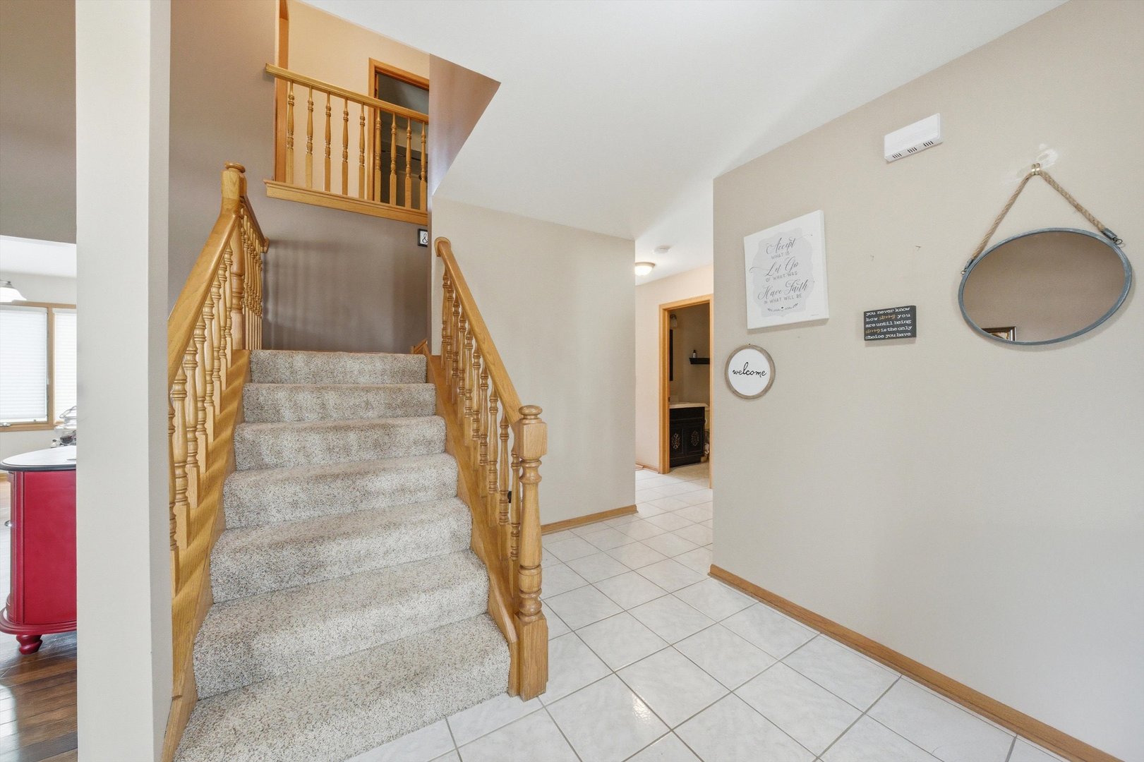 572 Bishops Gate New Lenox, IL 60451 - Photo 12 of 37 a view of an entryway with wooden floor