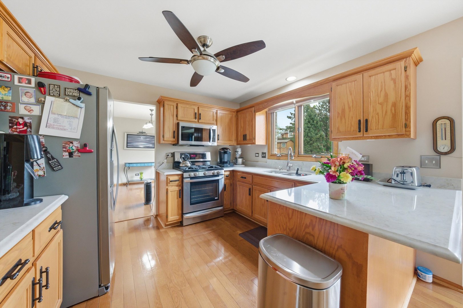 572 Bishops Gate New Lenox, IL 60451 - Photo 15 of 37 a kitchen with a sink appliances and cabinets