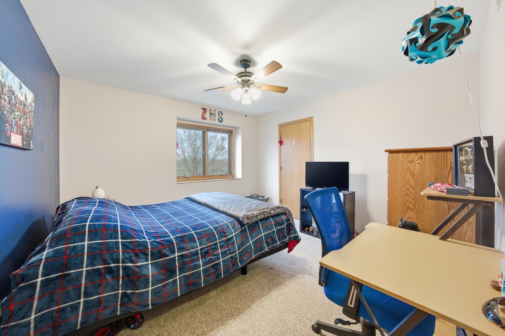 572 Bishops Gate New Lenox, IL 60451 - Photo 25 of 37 a bedroom with a bed and a chandelier