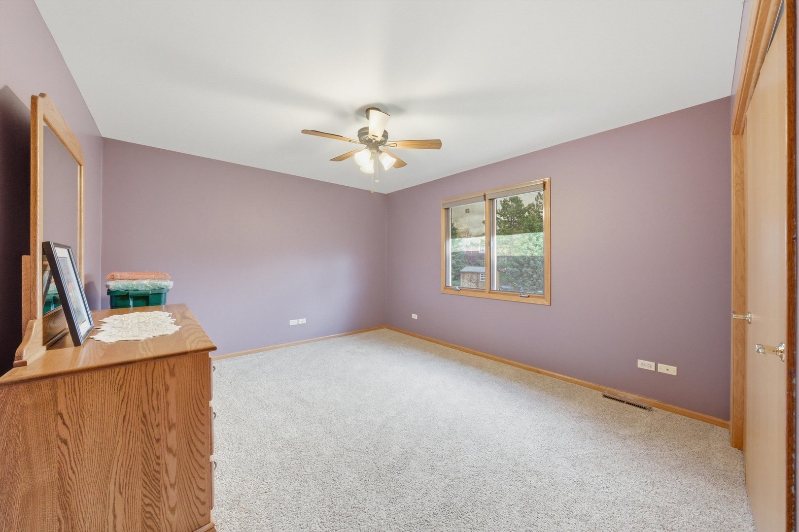 572 Bishops Gate New Lenox, IL 60451 - Photo 27 of 37 an empty room with windows and ceiling fan