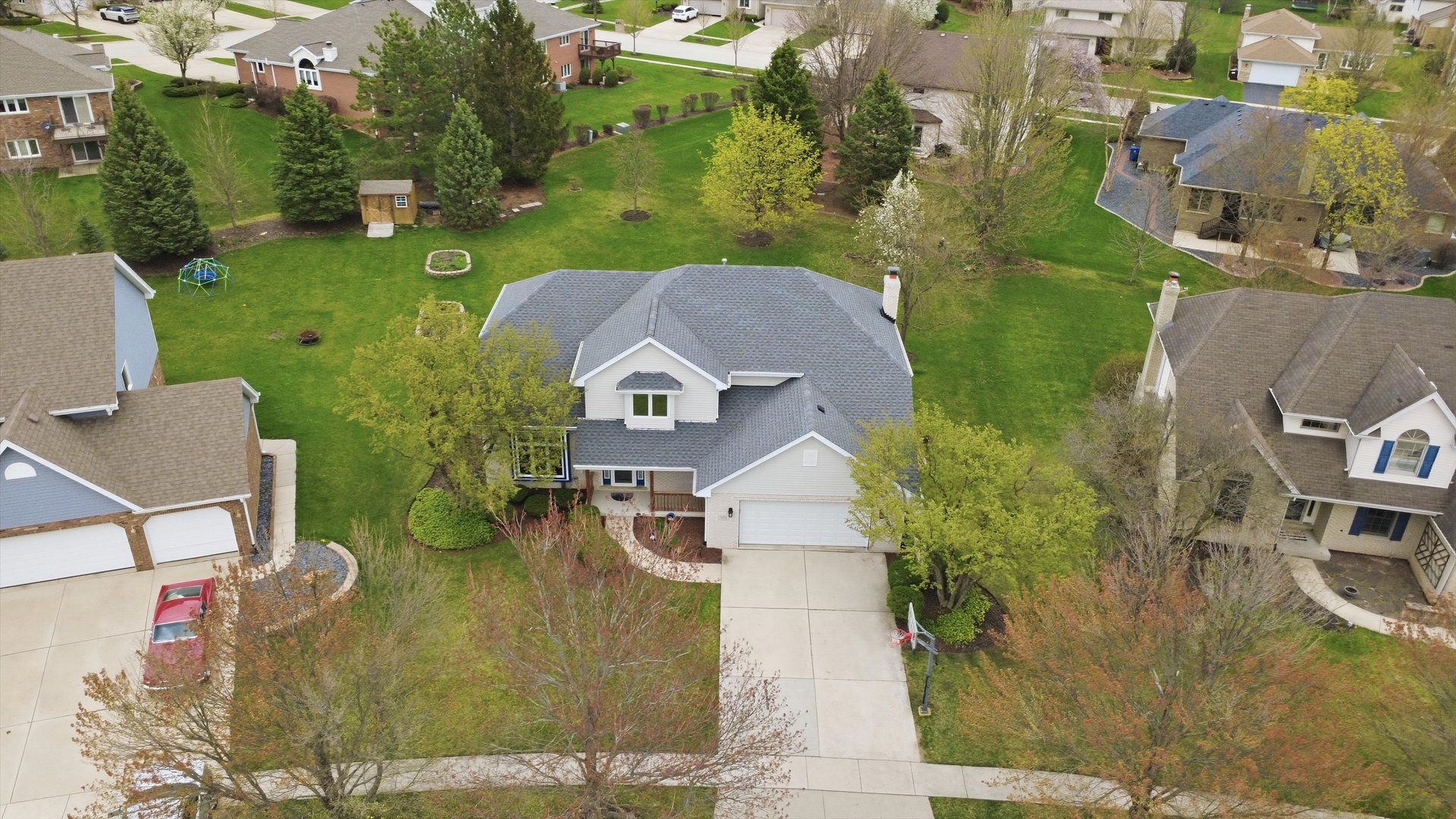 572 Bishops Gate New Lenox, IL 60451 - Photo 7 of 37 an aerial view of a house with swimming pool outdoor seating and yard