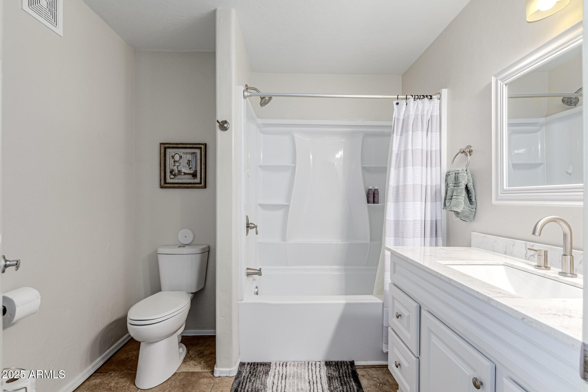 1287 North Alma School Road, Unit 156 Chandler, AZ 85224 - Photo 14 of 34 a bathroom with a sink toilet and shower